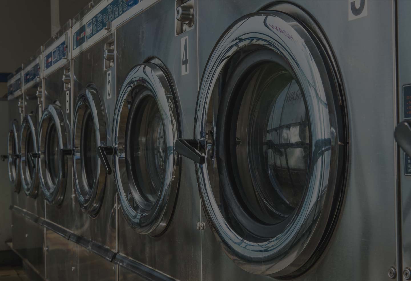 row of commercial washers