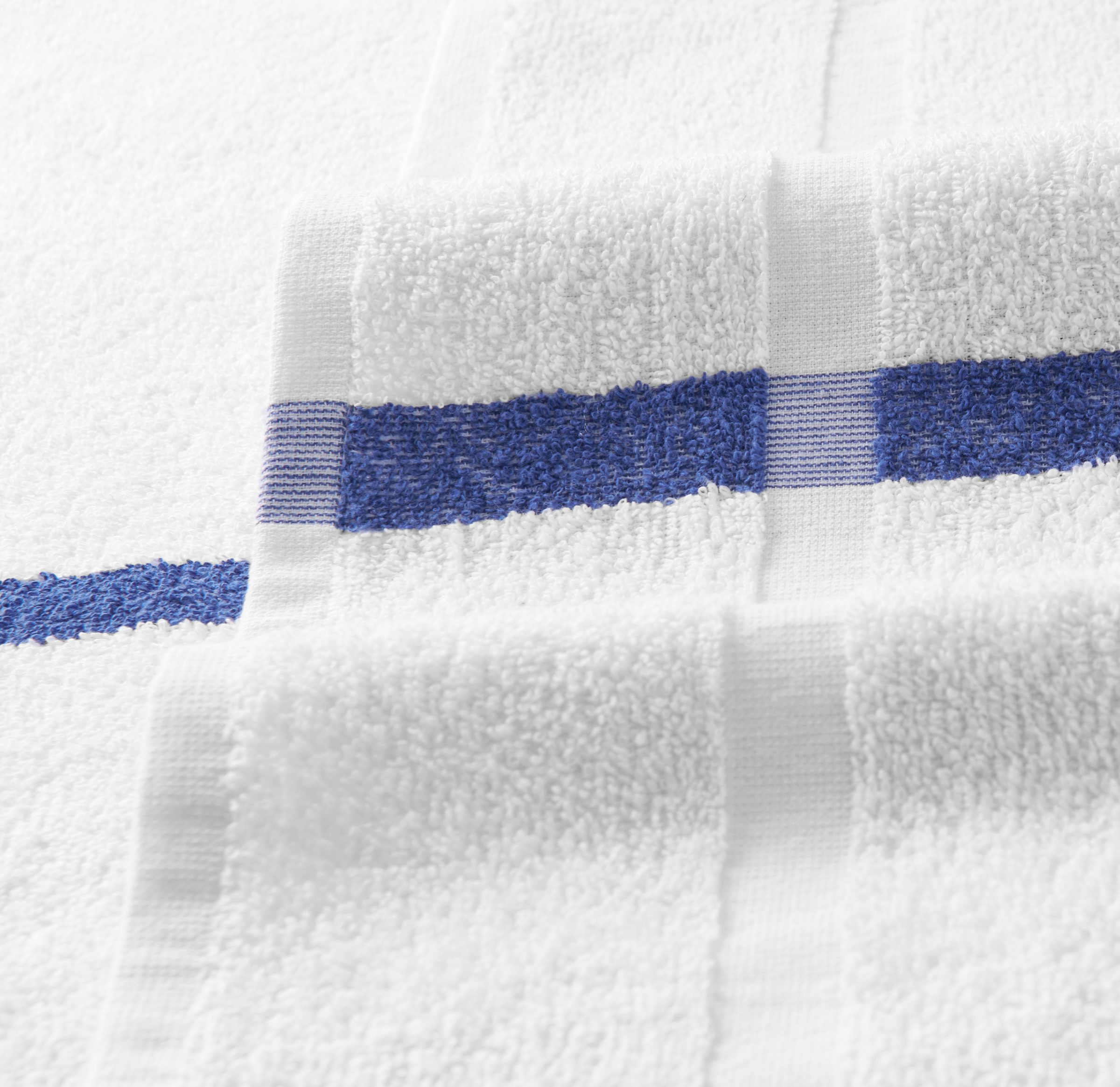 https://www.monarchbrands.com/wp-content/uploads/2019/07/Admiral-Blue-Stripe-Pool-Towel-Dobby.jpg