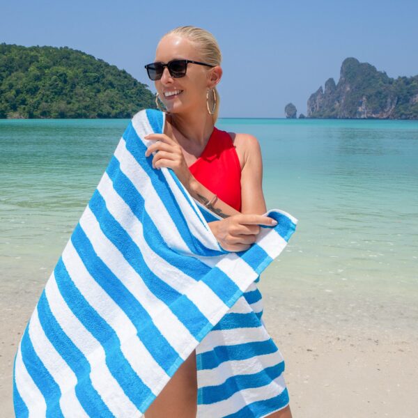 Blue Cabana Beach Towel wrapped around woman