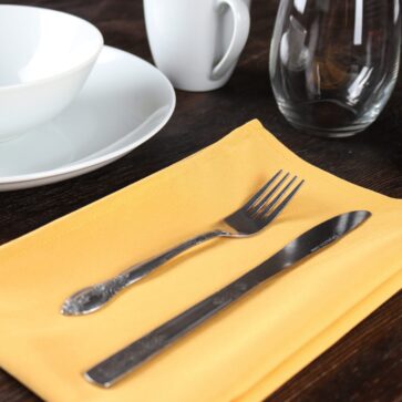 Cutlery on gold spun poly napkin