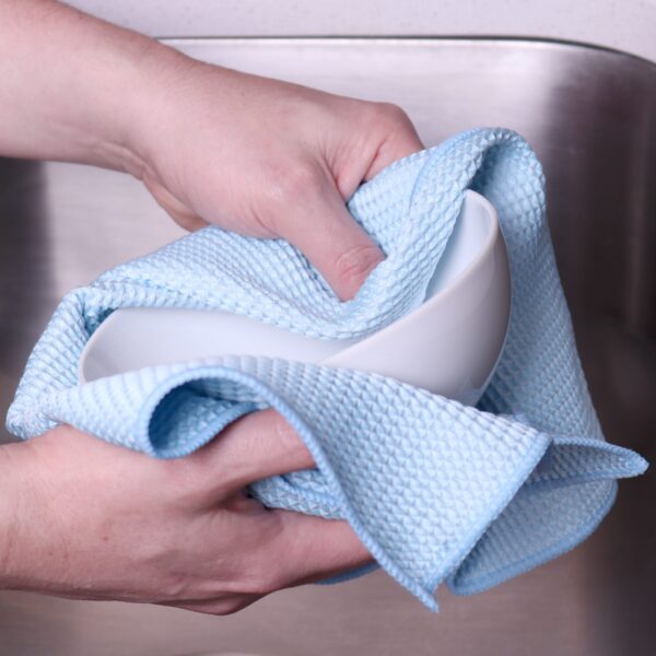 Blue Waffle Microfiber Hand Towels used to dry bowl