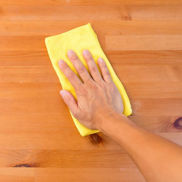 Yellow Microfiber Cloth used to wipe down table