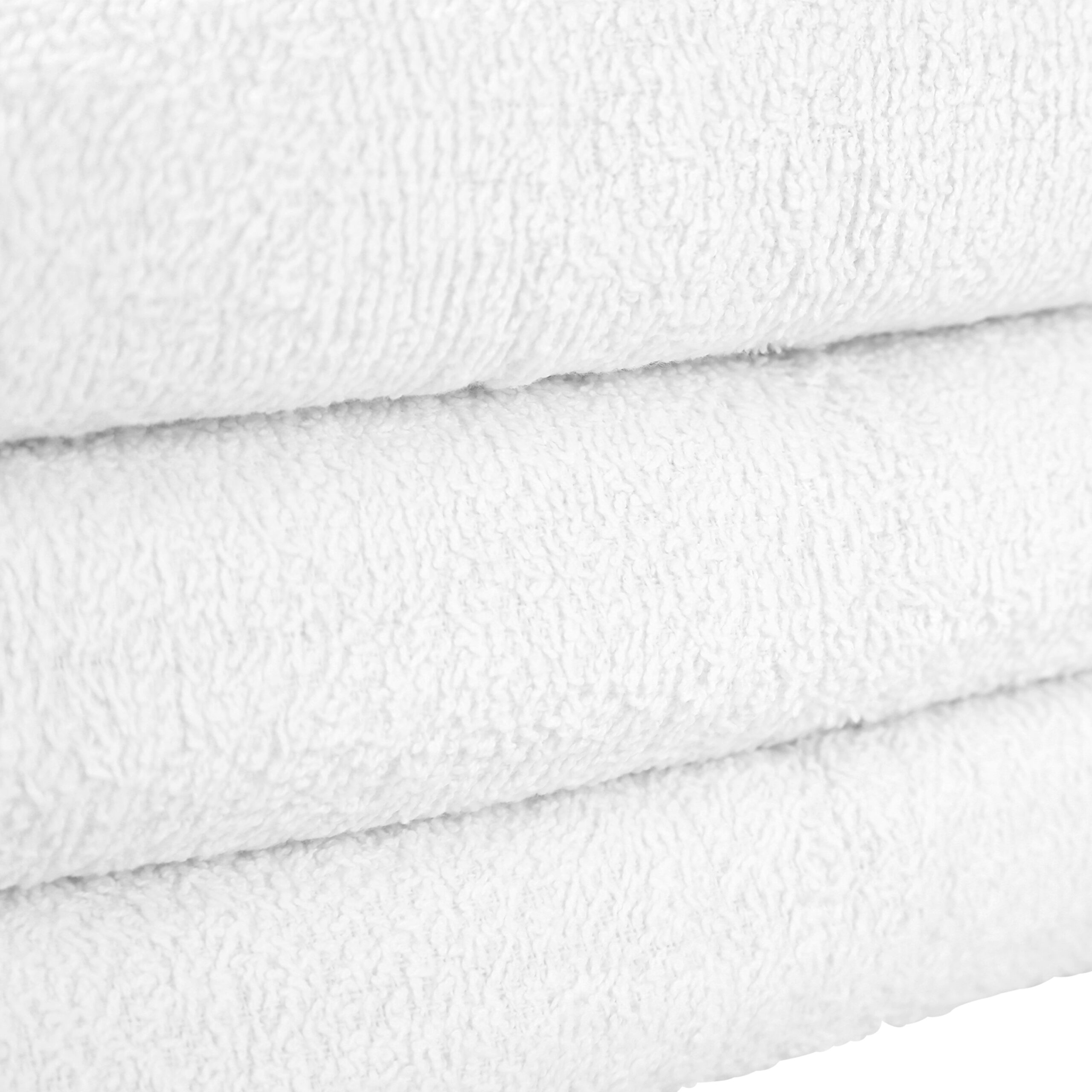 White Bath Towels stacked closeup