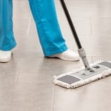 Janitor mopping floor