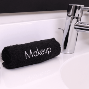 Makeup Towel rolled up on bathroom counter