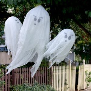 DIY ghosts hanging on trees