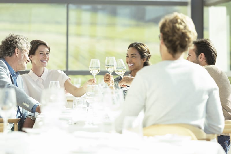 Diners toasting at restaurant