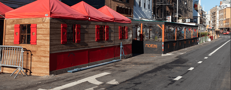 Restaurants expanded onto street causing parking issues