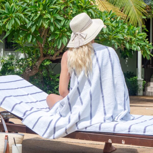 CC-HS3085-LG-2PK towel wrapped around woman sitting on pool chair