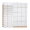 Stack of white kitchen towels with tan